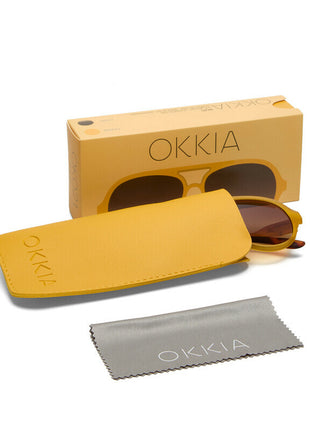 OK021-TYE Okkia Alessio unisex zonnebril transparant geel met bruine glazen